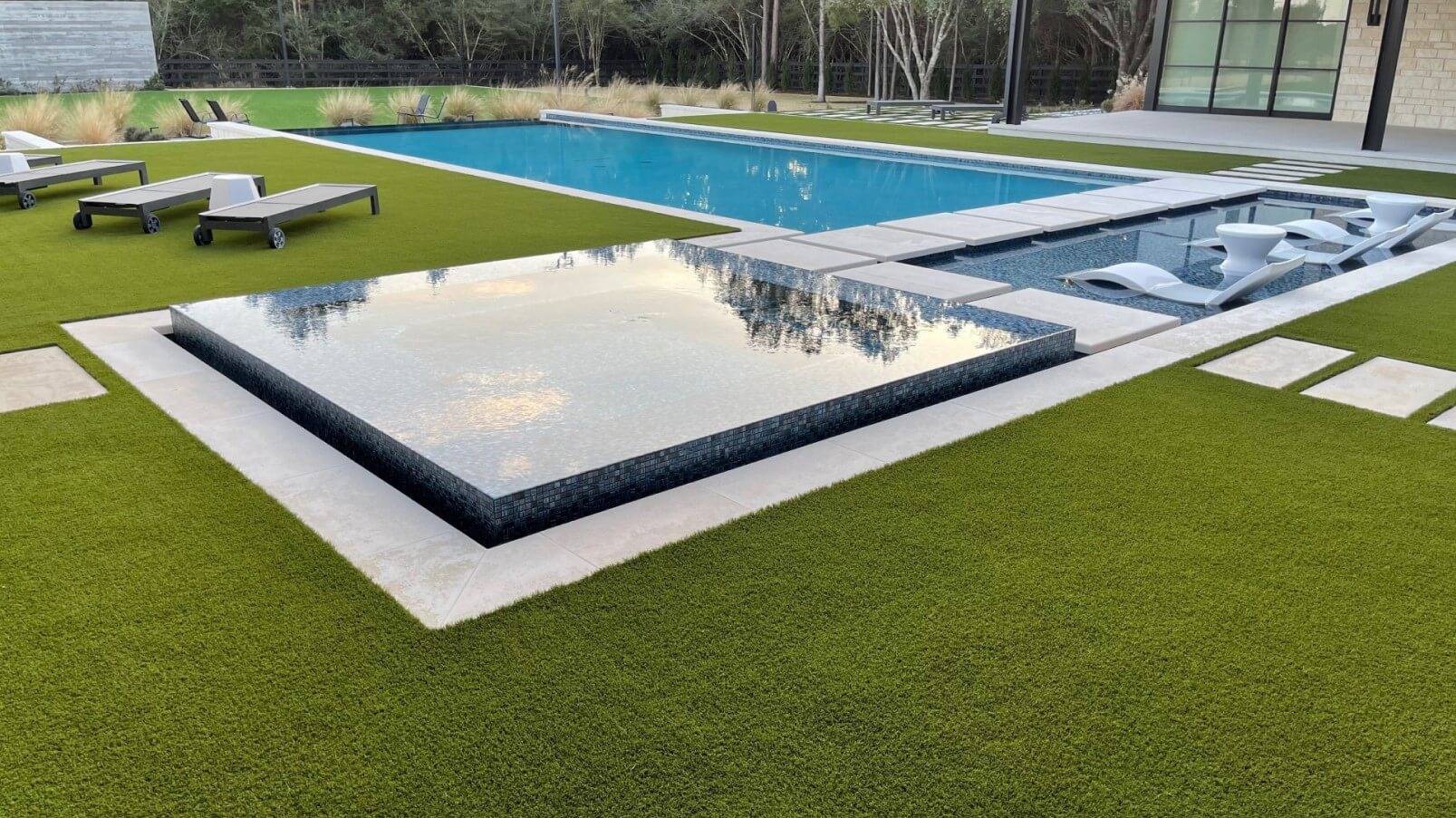 Residential artificial grass installation with pool in Denton, TX